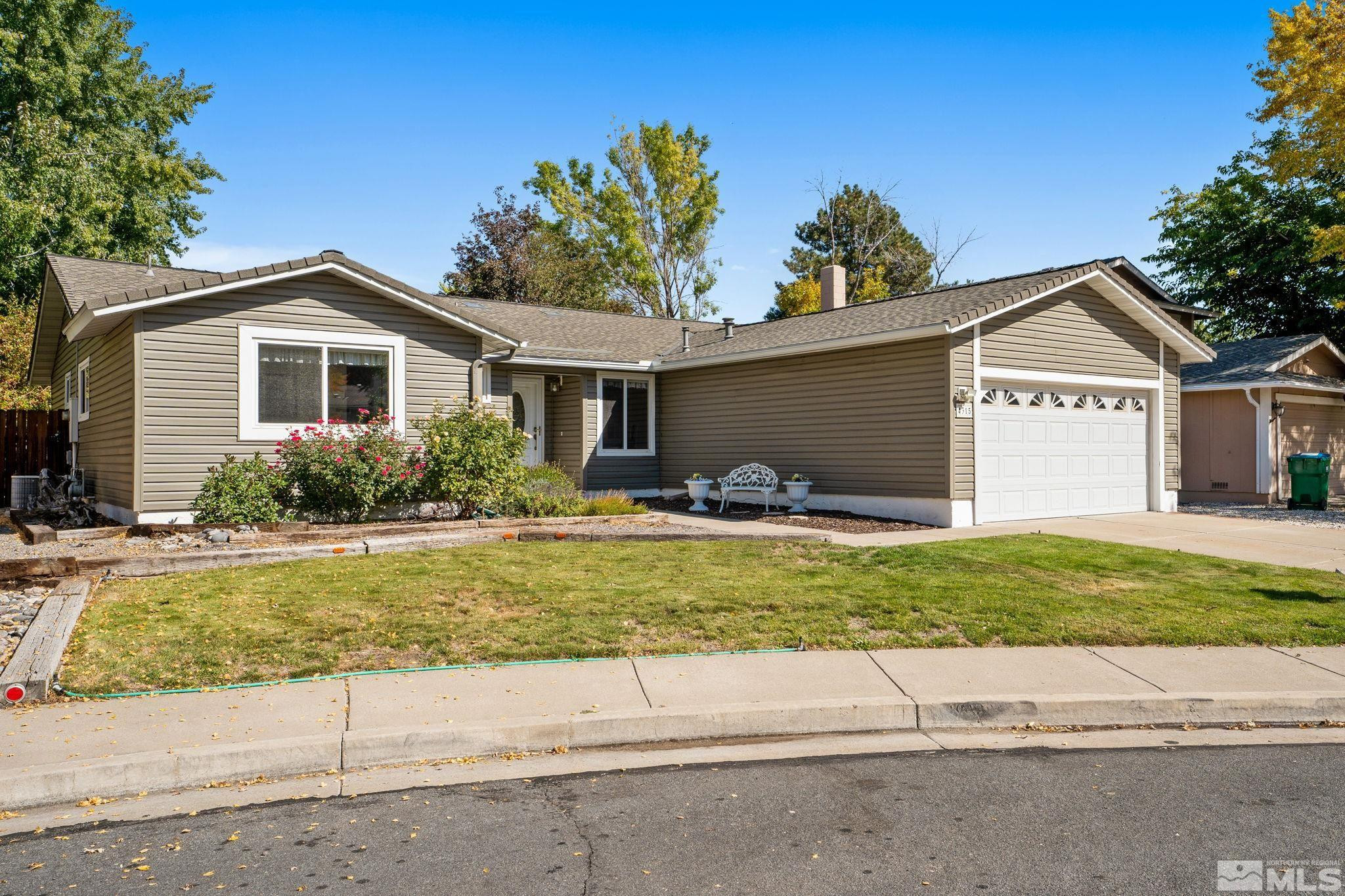 4315 Mendocino Lane Reno, NV 89502 - Photo 3 of 31 a view of a house with a yard