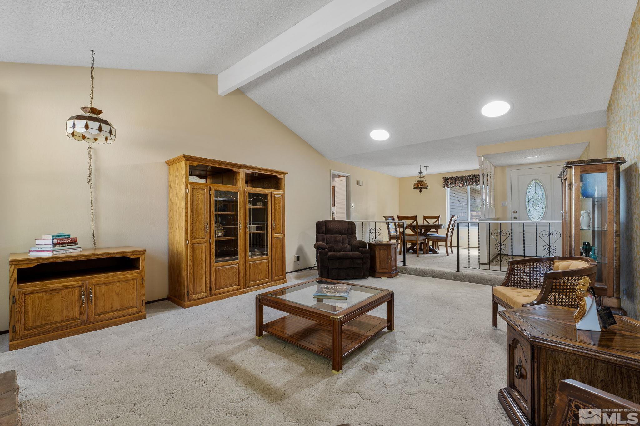 4315 Mendocino Lane Reno, NV 89502 - Photo 9 of 31 a living room with furniture and a flat screen tv