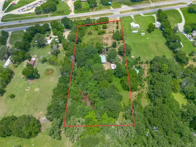 a view of a lush green field