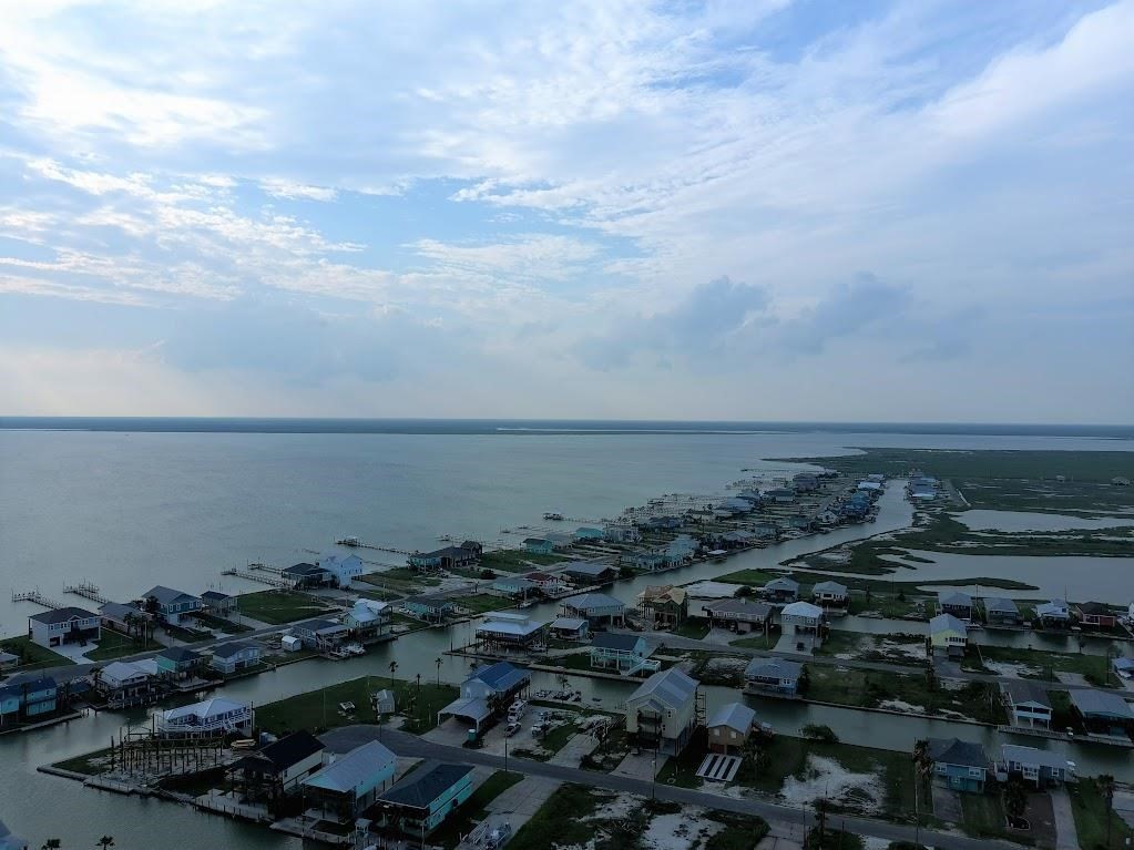 74 Newcomb Bend Loop Rockport, TX 78382 - Photo 11 of 31 an aerial view of multiple house