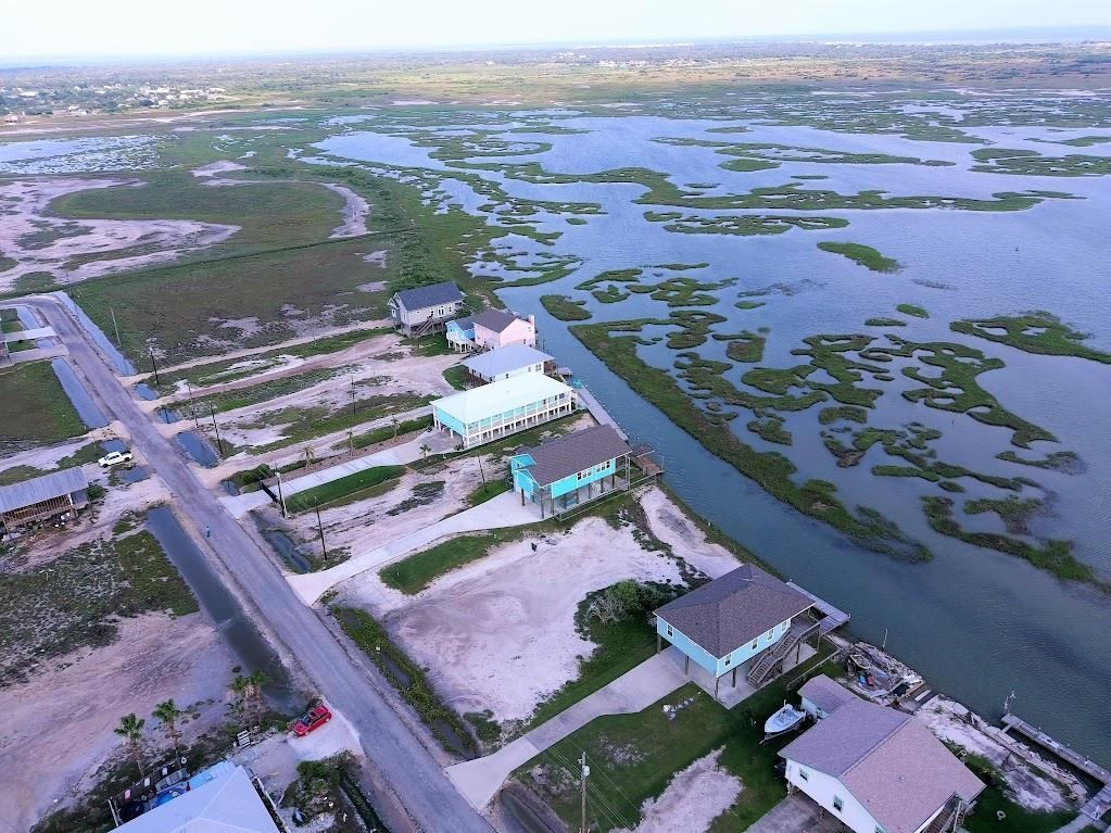 74 Newcomb Bend Loop Rockport, TX 78382 - Photo 12 of 31 an aerial view of residential house with outdoor space