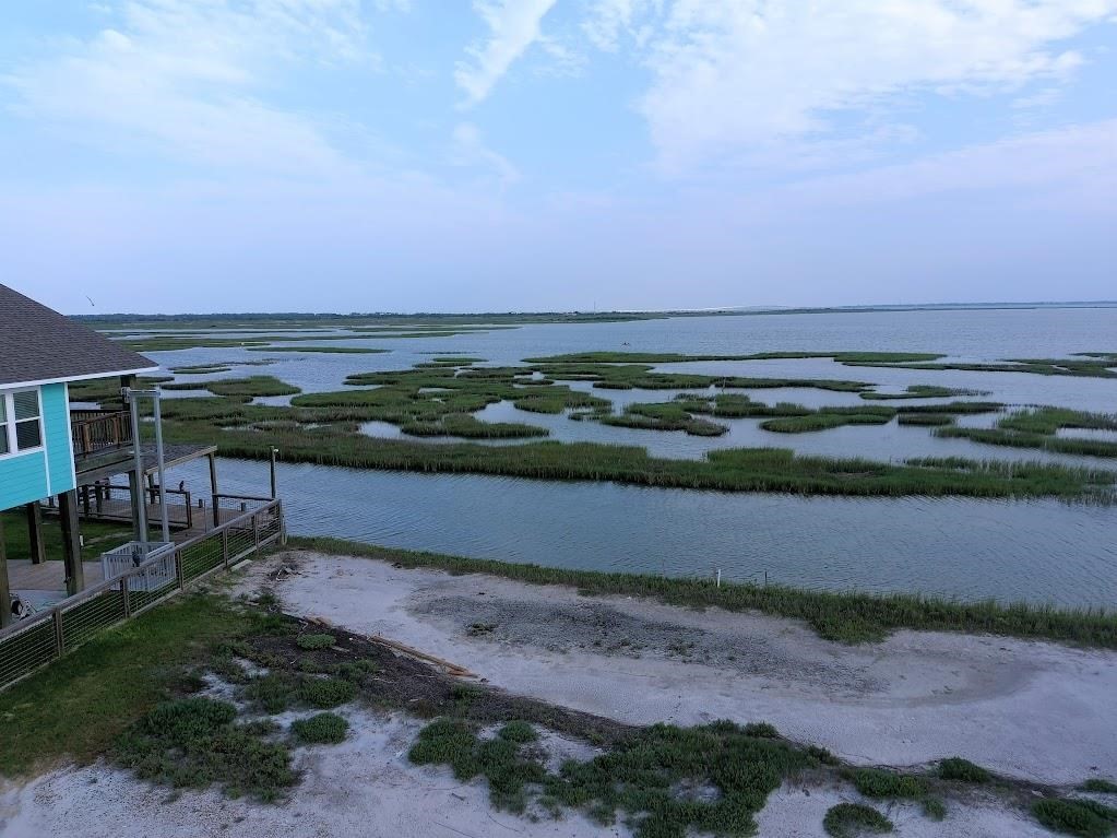 74 Newcomb Bend Loop Rockport, TX 78382 - Photo 15 of 31 an aerial view of a house with a yard