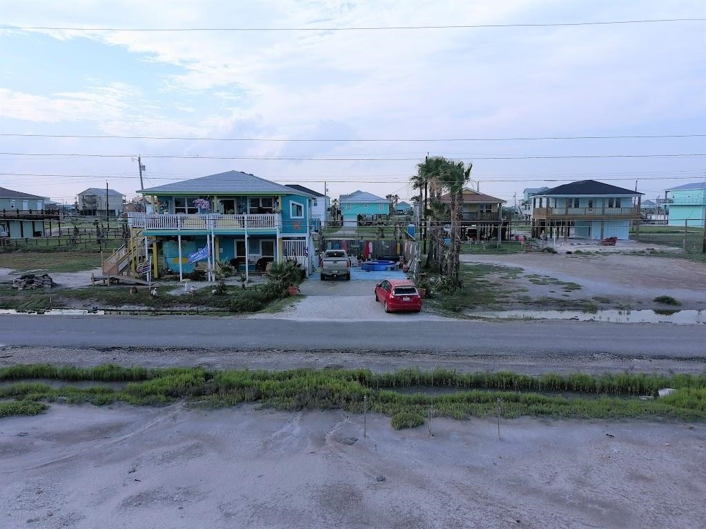 74 Newcomb Bend Loop Rockport, TX 78382 - Photo 16 of 31 a view of multiple houses with a yard