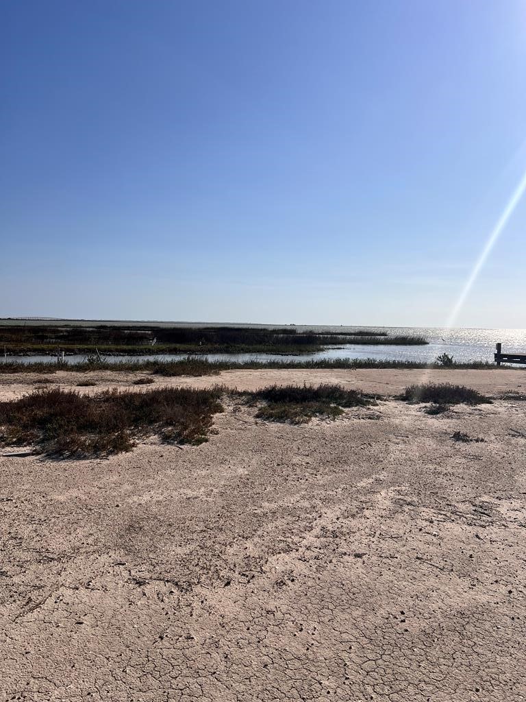 74 Newcomb Bend Loop Rockport, TX 78382 - Photo 29 of 31 a view of an ocean beach