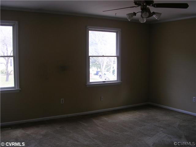 108 Tudor Road Colonial Heights, VA 23834 - Photo 6 of 12 an empty room with a window