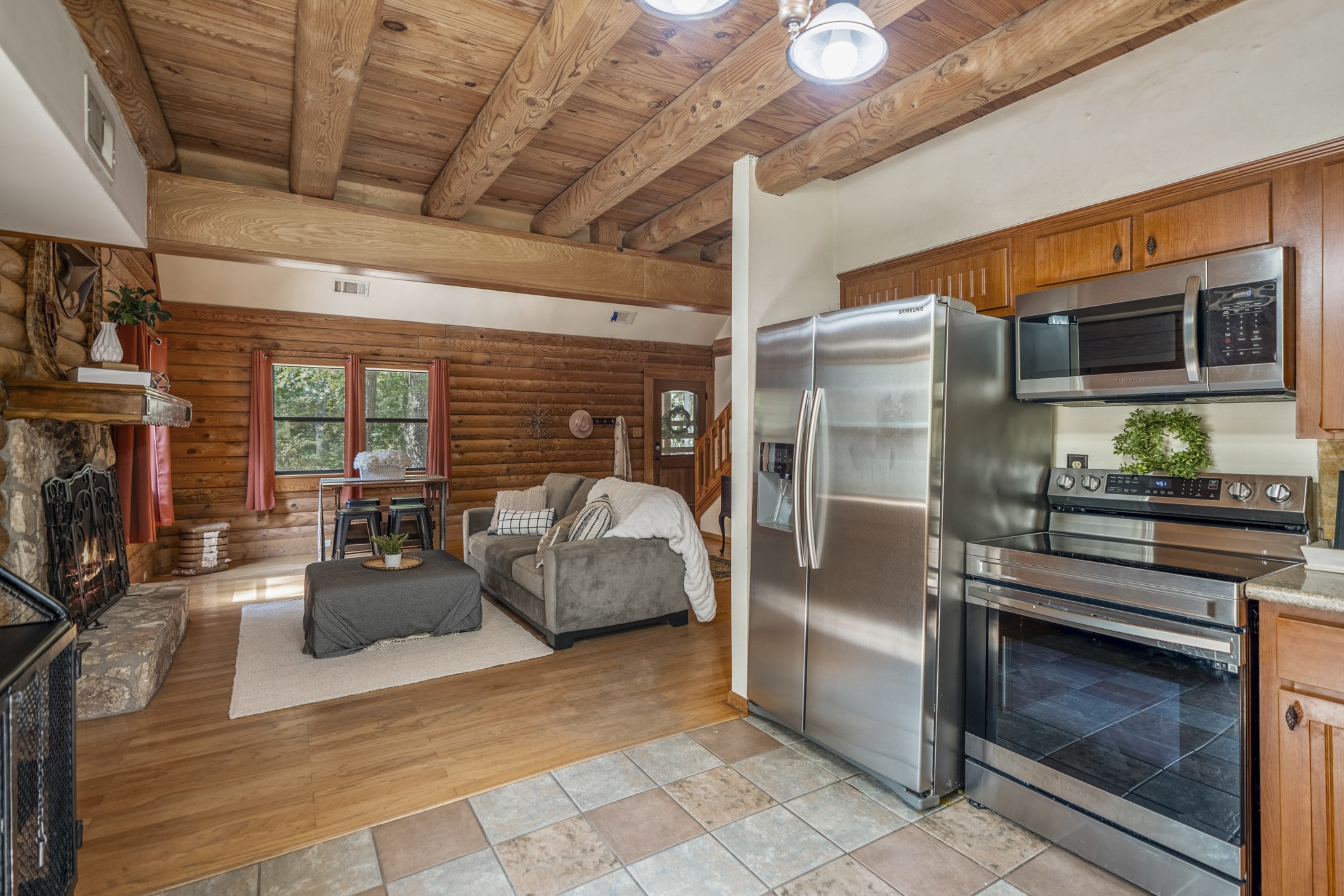 31370 Lazy Ridge Drive Waller, TX 77484 - Photo 43 of 43 a kitchen with counter top oven and refrigerator
