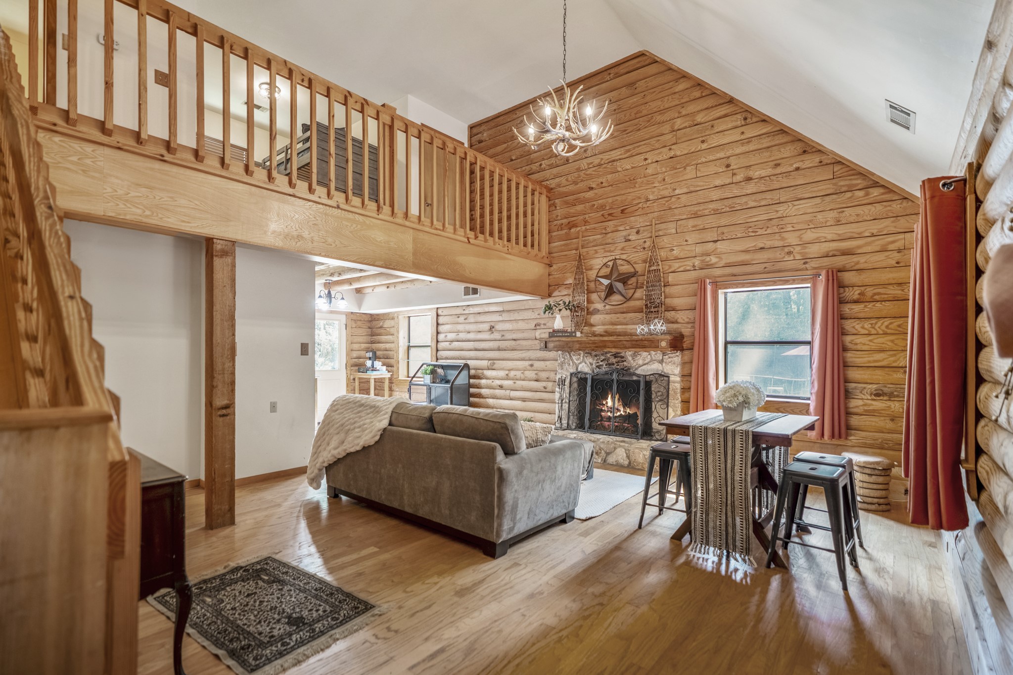 31370 Lazy Ridge Drive Waller, TX 77484 - Photo 3 of 43 a living room with furniture a fireplace and wooden floor