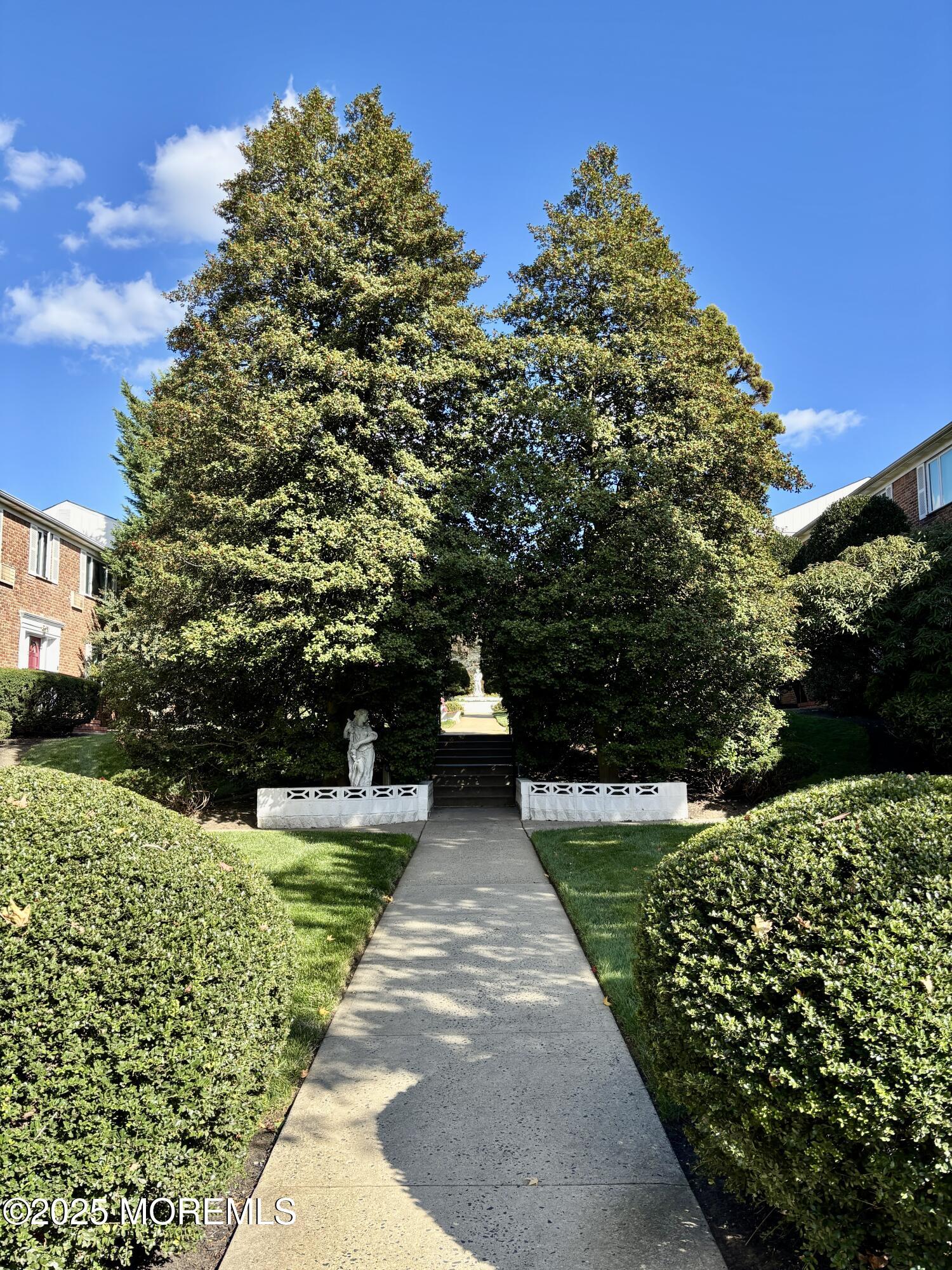 283 Spring Street, Unit 4C Red Bank, NJ 07701 - Photo 20 of 29 a view of a back yard of the house