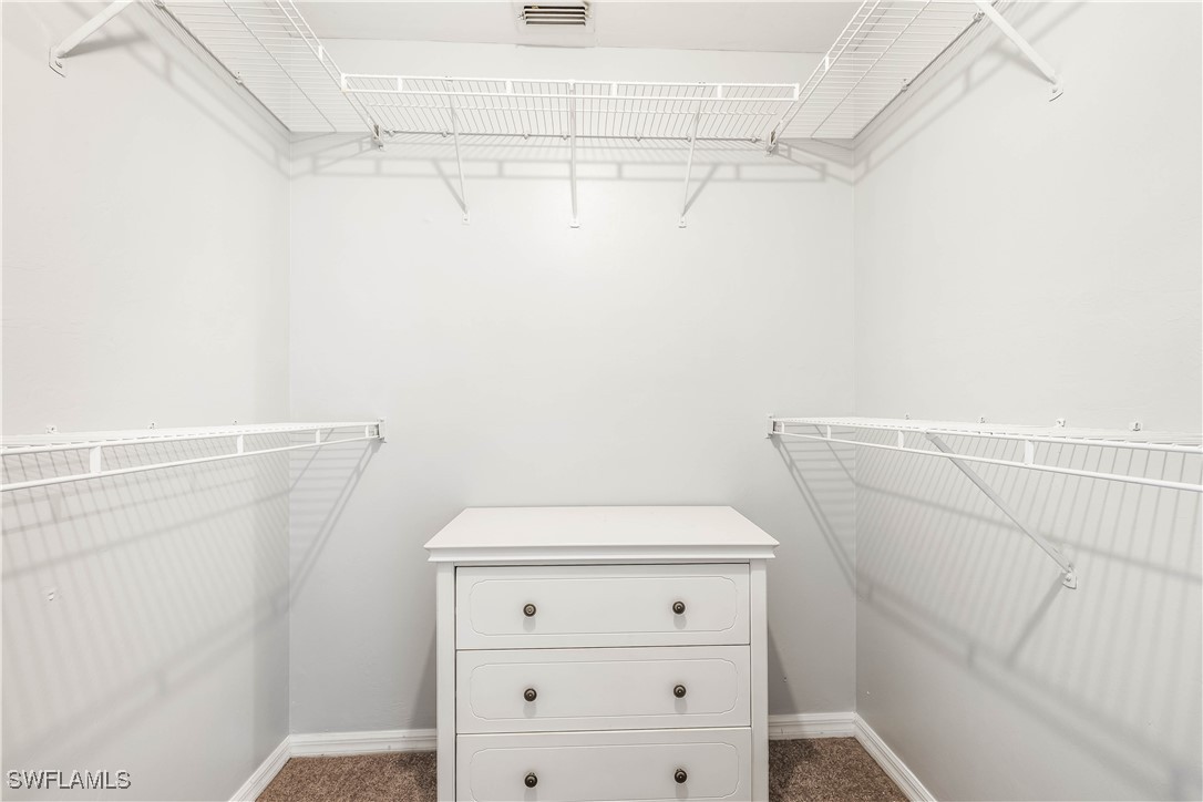 8457 Robin Road Fort Myers, FL 33967 - Photo 15 of 18 a bathroom with a shower and toilet
