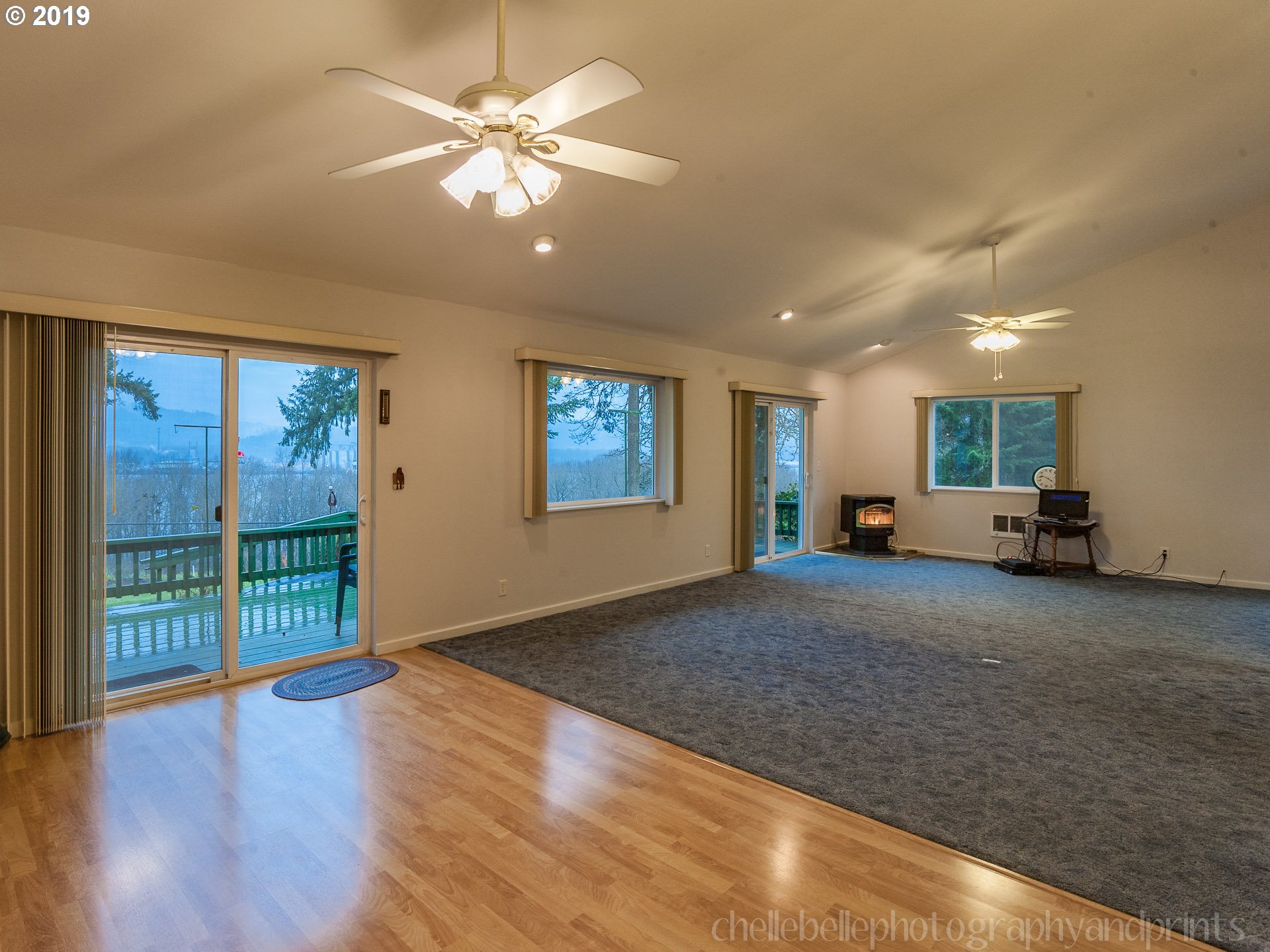 70740 Neer City Road Rainier, OR 97048 - Photo 5 of 21 a view of empty room with wooden floor and fan