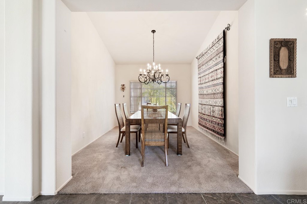 1667 Del Mar Road Oceanside, CA 92057 - Photo 11 of 51 a dining room with furniture and window