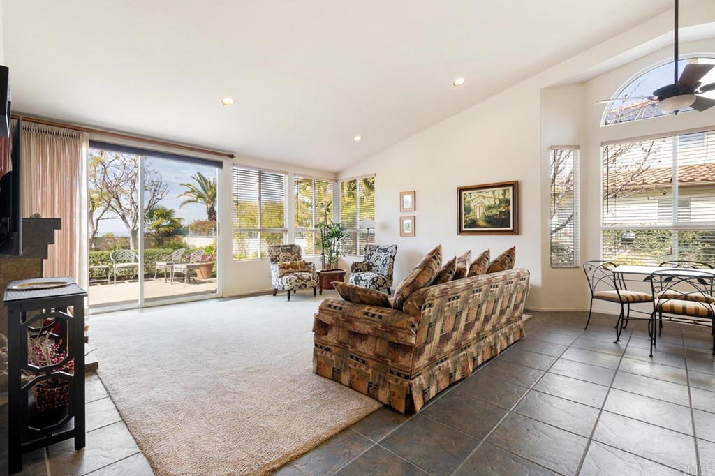 1667 Del Mar Road Oceanside, CA 92057 - Photo 17 of 51 a living room with furniture and a flat screen tv