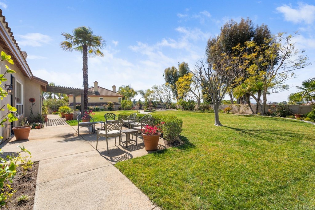 1667 Del Mar Road Oceanside, CA 92057 - Photo 35 of 51 a view of a backyard with sitting area