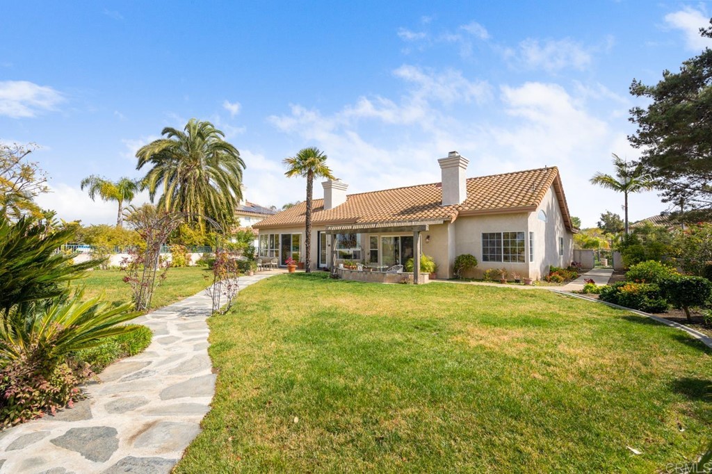 1667 Del Mar Road Oceanside, CA 92057 - Photo 37 of 51 a front view of house with yard
