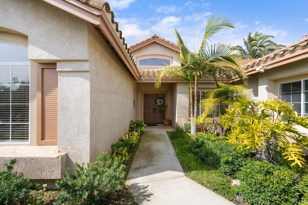 1667 Del Mar Road Oceanside, CA 92057 - Photo 4 of 51 a view of a pathway with flower plants