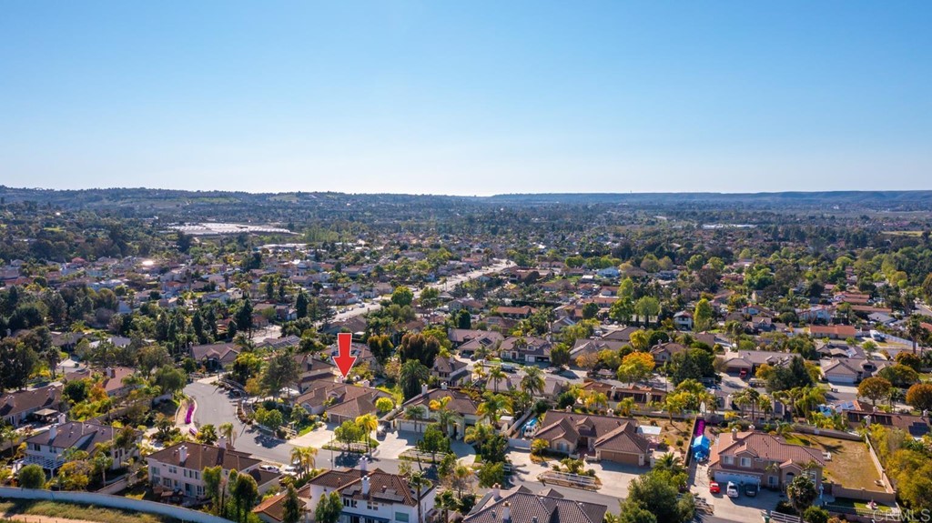 1667 Del Mar Road Oceanside, CA 92057 - Photo 47 of 51 an aerial view of house with yard and mountain view in back