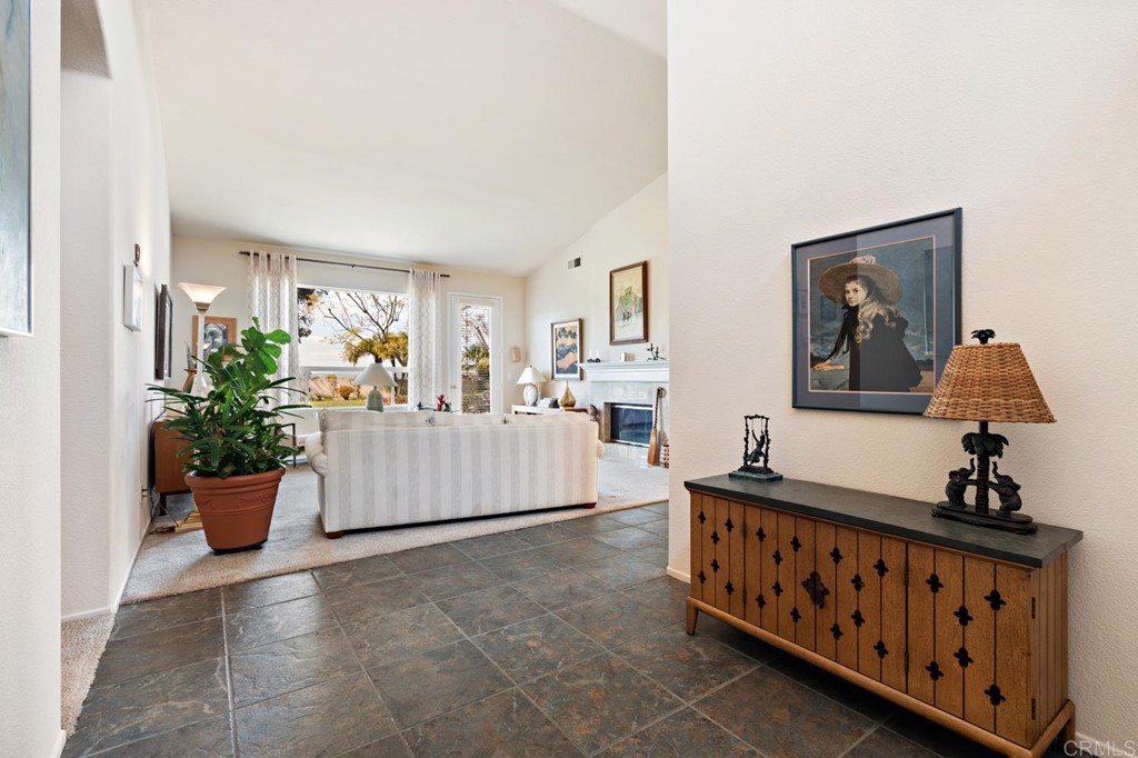 1667 Del Mar Road Oceanside, CA 92057 - Photo 5 of 51 a bedroom with furniture and a window