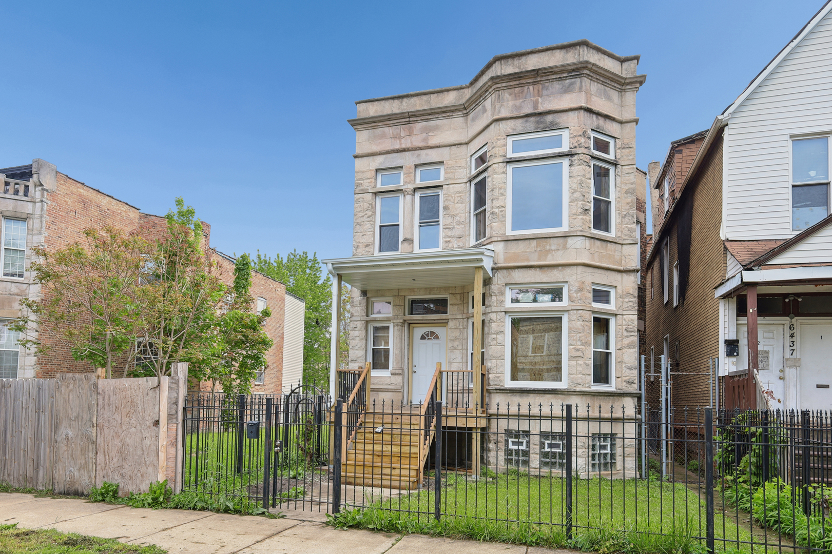 6433 South Sangamon Street Chicago, IL 60621 - Photo 2 of 26 a front view of a house