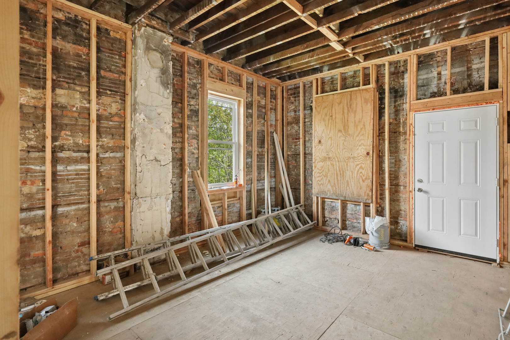 6433 South Sangamon Street Chicago, IL 60621 - Photo 5 of 26 a view of an empty room with a window
