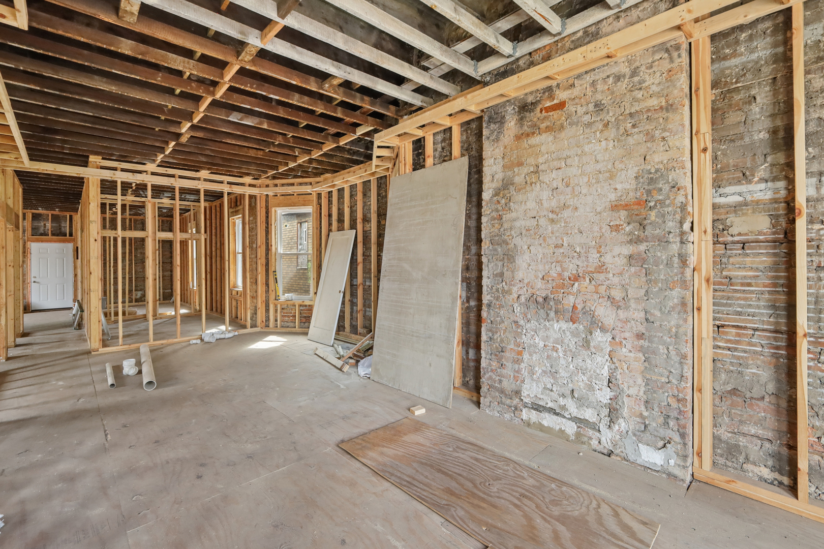 6433 South Sangamon Street Chicago, IL 60621 - Photo 10 of 26 a view of a room with wooden walls