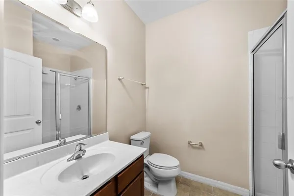 a bathroom with a sink toilet and vanity