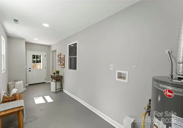 a view of a livingroom with furniture