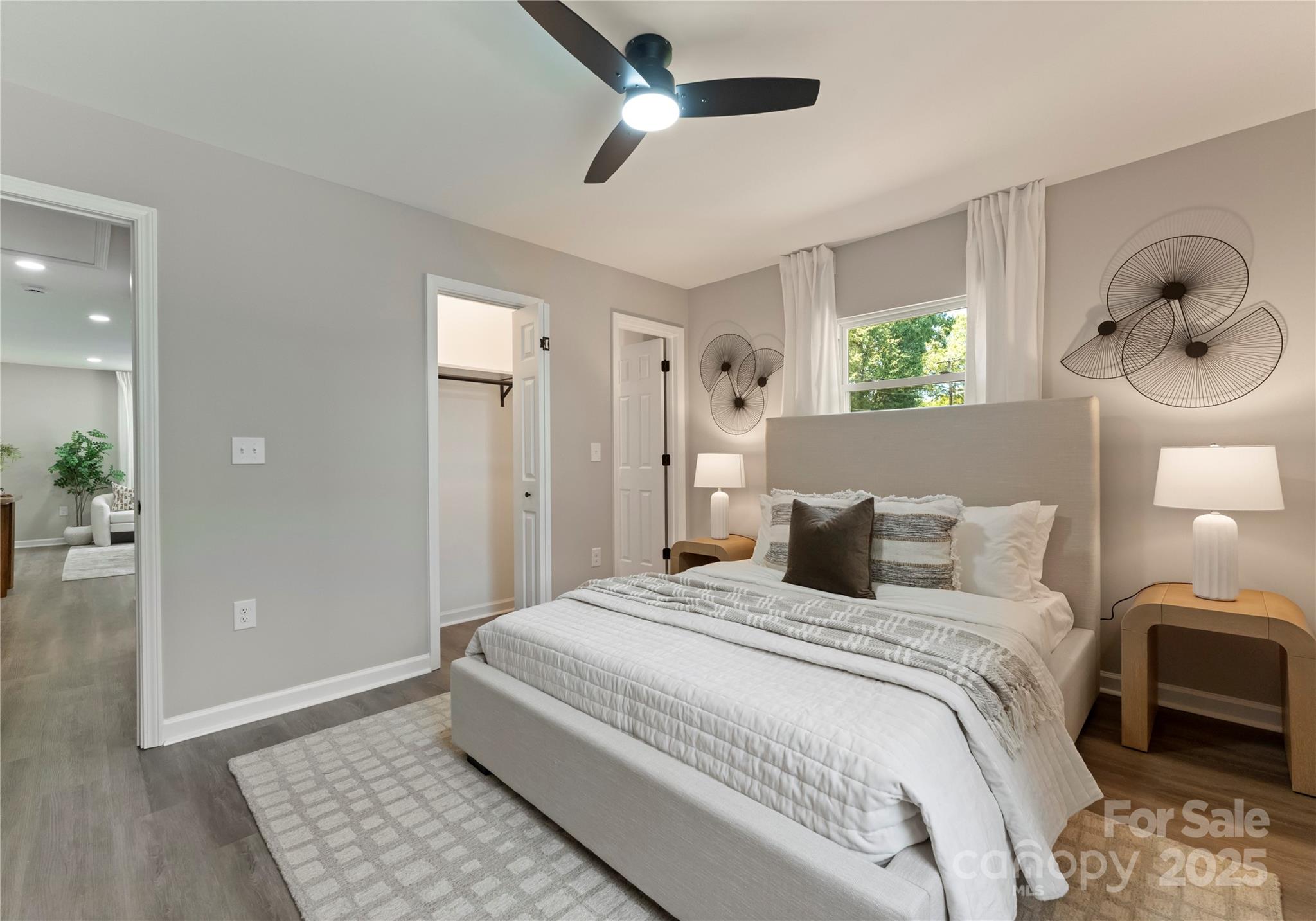 2900 Enfield Road Charlotte, NC 28205 - Photo 20 of 35 a bedroom with a bed and a chandelier