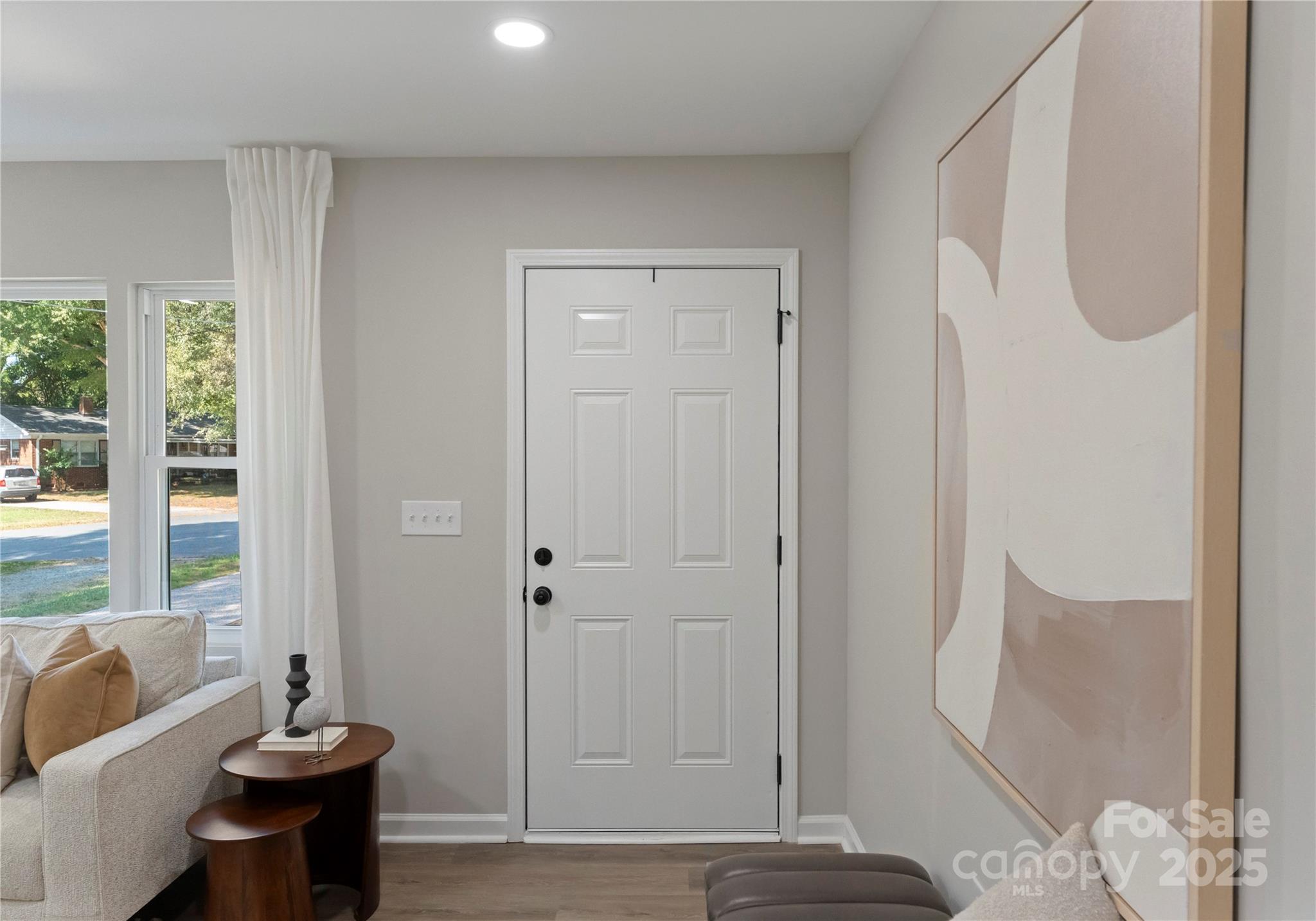 2900 Enfield Road Charlotte, NC 28205 - Photo 23 of 35 a living room with furniture and a potted plant