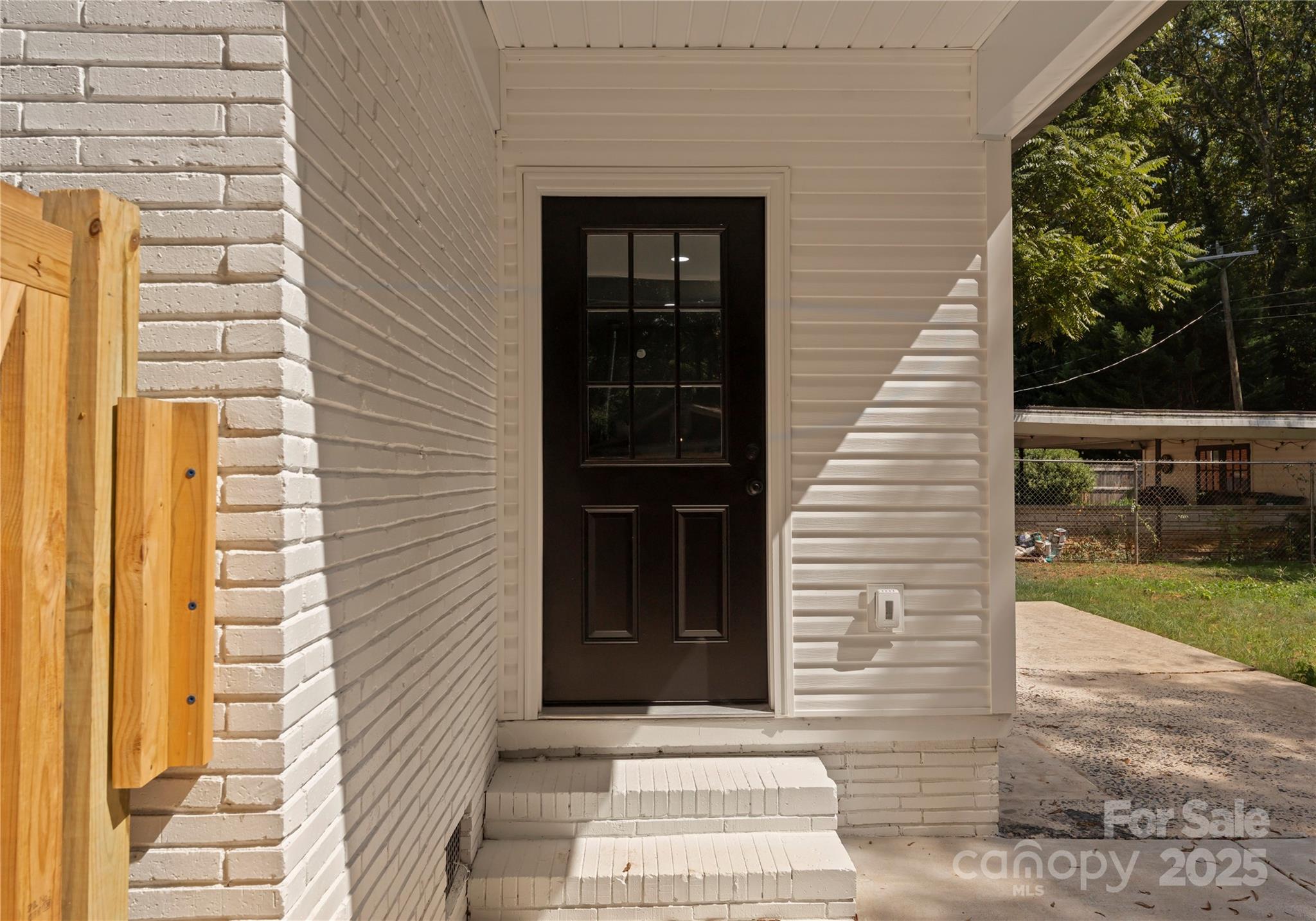 2900 Enfield Road Charlotte, NC 28205 - Photo 24 of 35 a view of a door and brick walls