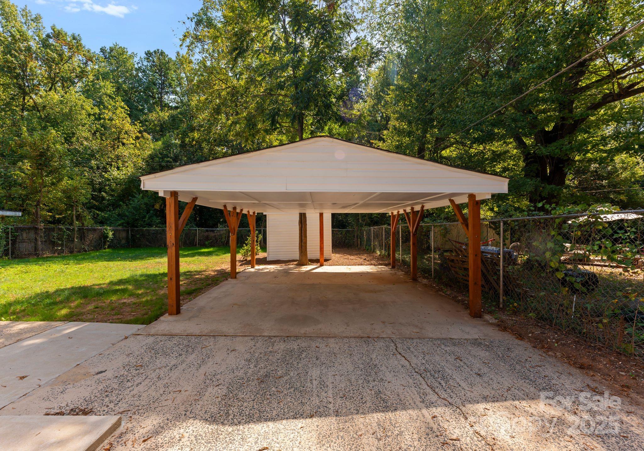 2900 Enfield Road Charlotte, NC 28205 - Photo 26 of 35 a house with swimming pool in front of it