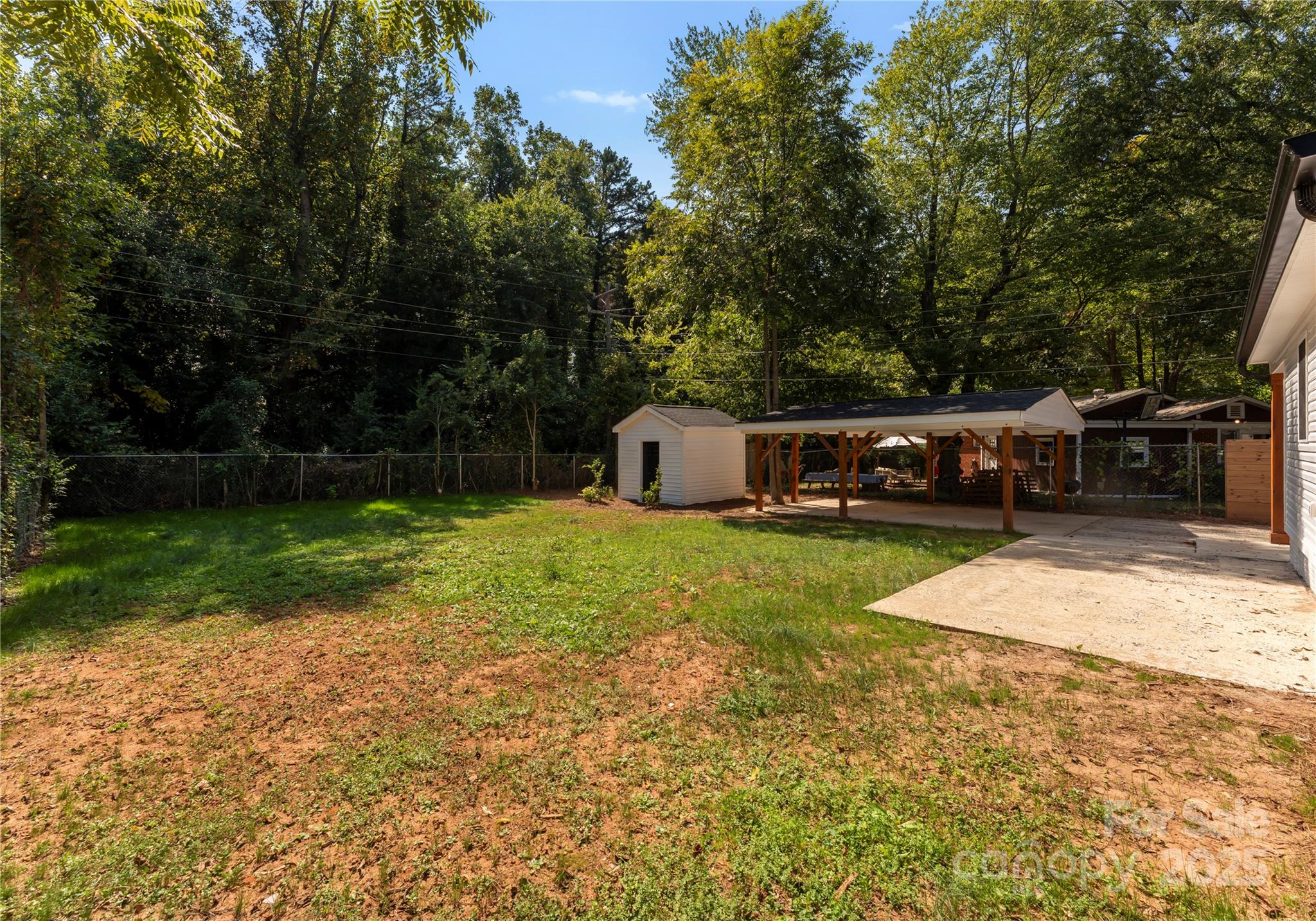 2900 Enfield Road Charlotte, NC 28205 - Photo 31 of 35 a front view of a house with garden