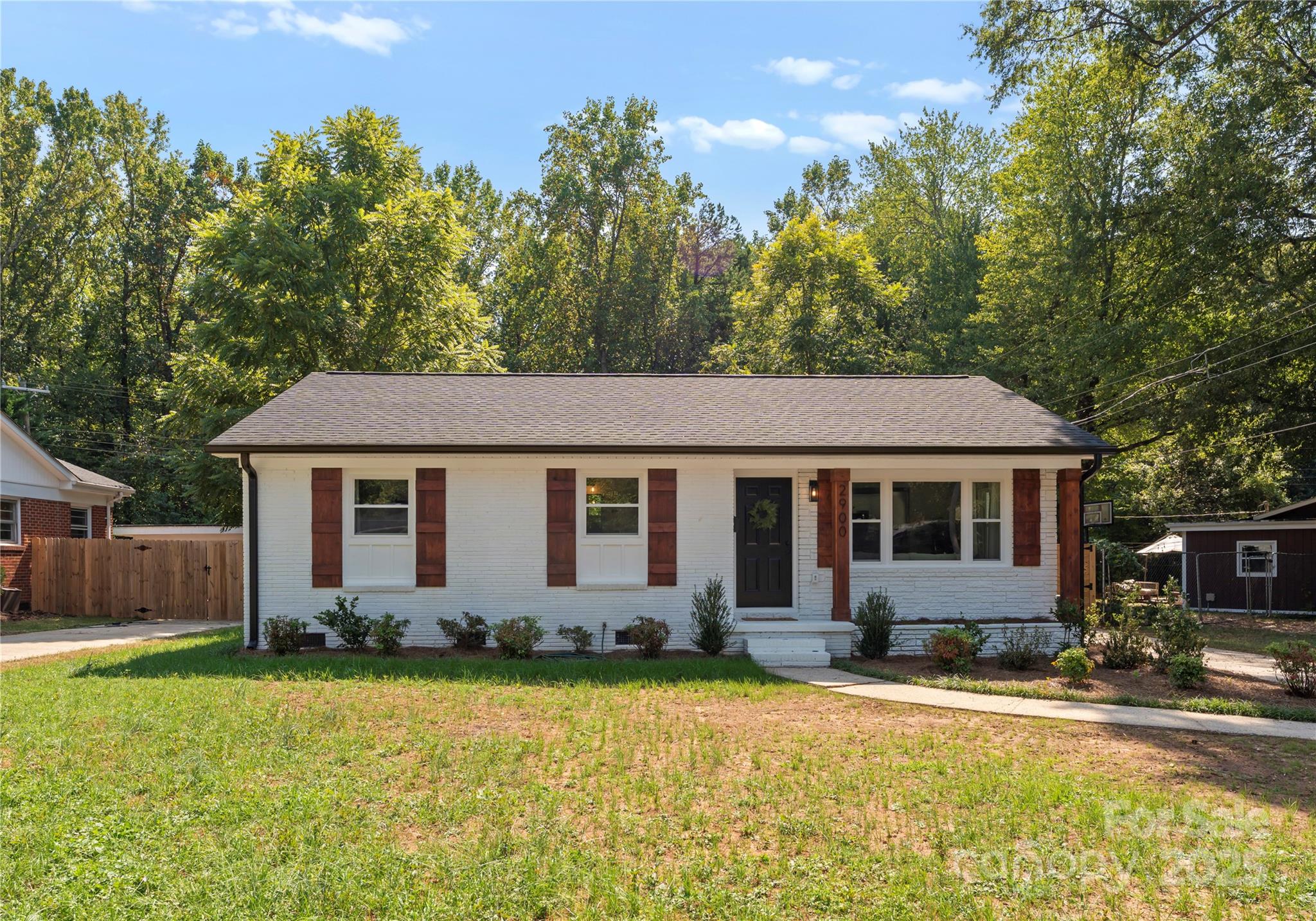 2900 Enfield Road Charlotte, NC 28205 - Photo 34 of 35 front view of a house with a yard