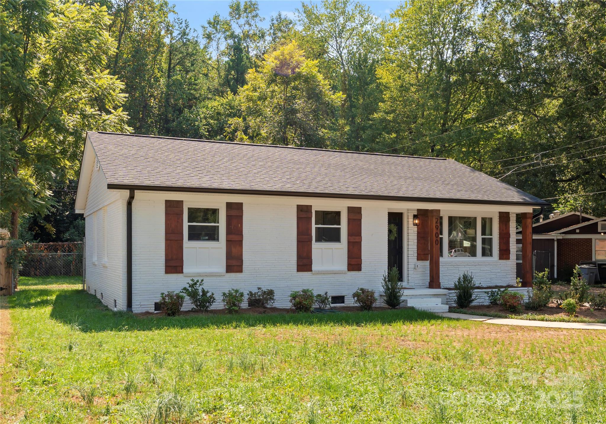 2900 Enfield Road Charlotte, NC 28205 - Photo 35 of 35 a front view of a house with yard and green space
