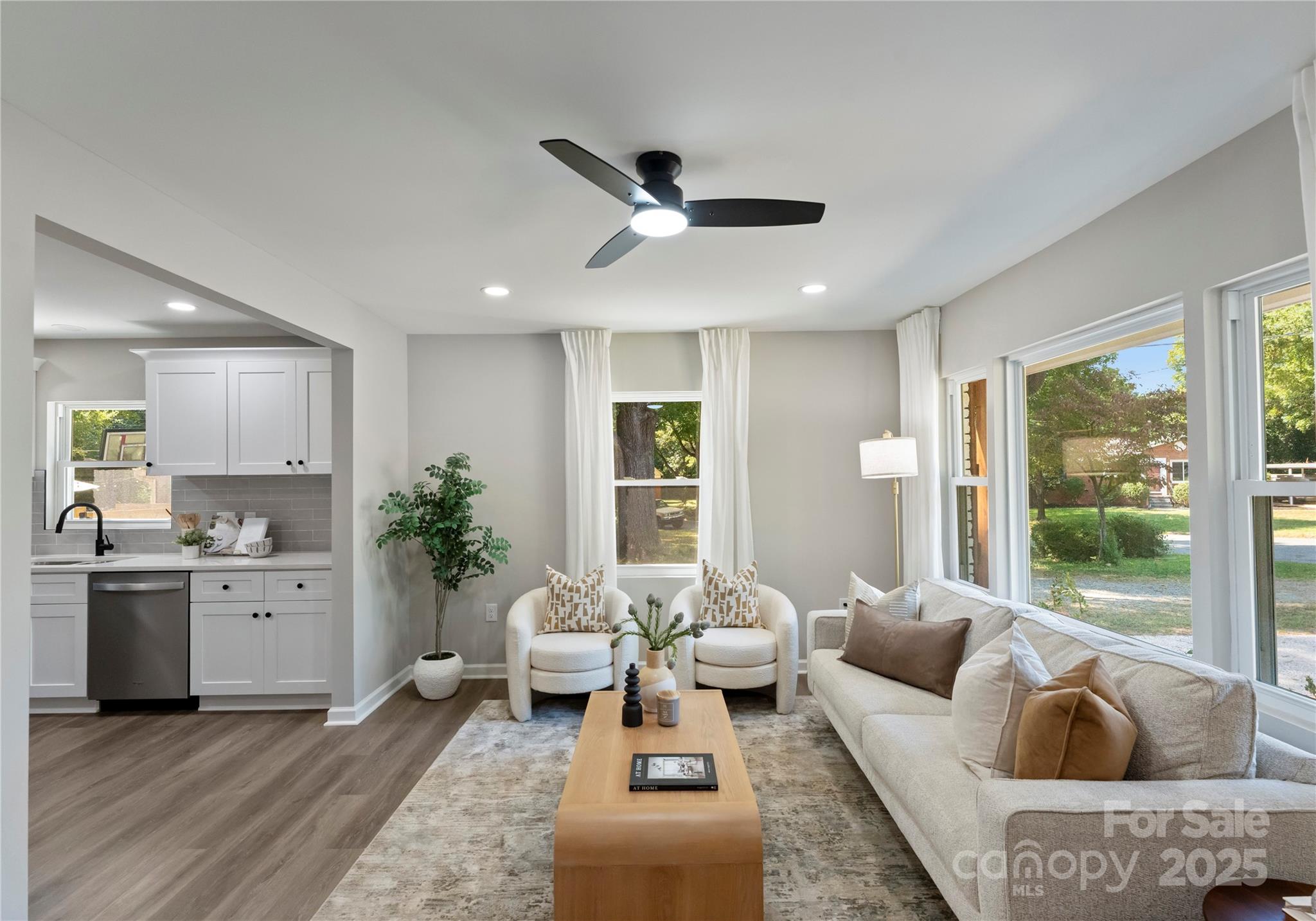 2900 Enfield Road Charlotte, NC 28205 - Photo 4 of 35 a living room with furniture and a large window