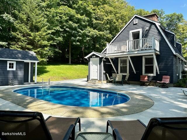2631 Hancock Road Hancock, MA 01267 - Photo 1 of 55 a view of a house with pool and chairs