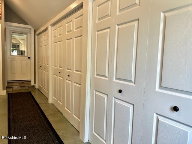 2631 Hancock Road Hancock, MA 01267 - Photo 14 of 55 a view of a hallway with wooden floor and staircase