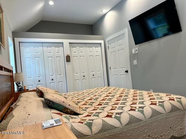 2631 Hancock Road Hancock, MA 01267 - Photo 16 of 55 a bedroom with a bed and a flat screen tv