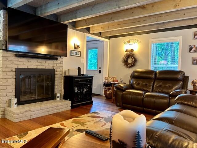 2631 Hancock Road Hancock, MA 01267 - Photo 30 of 55 a living room with furniture a flat screen tv and a fireplace