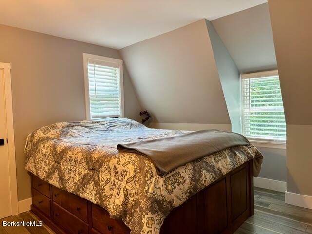 2631 Hancock Road Hancock, MA 01267 - Photo 37 of 55 a bed sitting in a bedroom next to a window