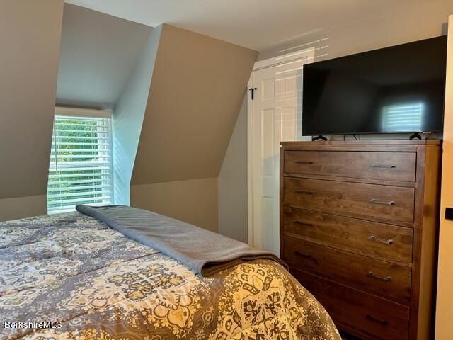 2631 Hancock Road Hancock, MA 01267 - Photo 38 of 55 a bedroom with a bed and flat screen tv