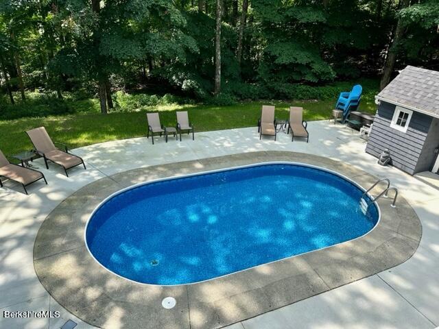 2631 Hancock Road Hancock, MA 01267 - Photo 44 of 55 a view of a swimming pool with a patio