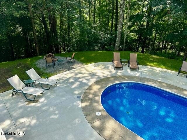 2631 Hancock Road Hancock, MA 01267 - Photo 45 of 55 a view of a swimming pool with a patio