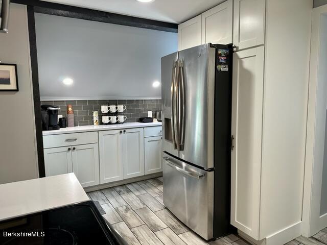 2631 Hancock Road Hancock, MA 01267 - Photo 10 of 55 a kitchen with a refrigerator sink and cabinets