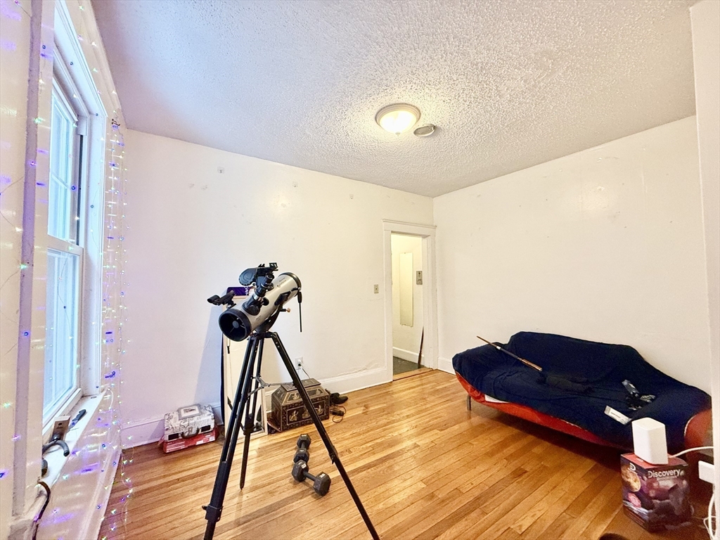 26 Chiswick Road, Unit 6 Boston, MA 02135 - Photo 6 of 24 a view of a room with gym equipment