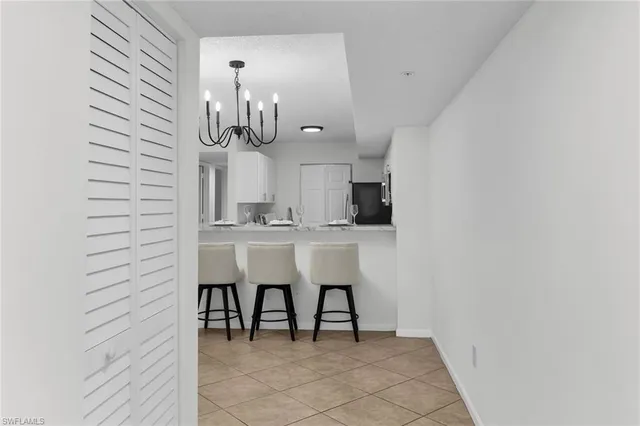 a kitchen with a sink cabinets and stainless steel appliances