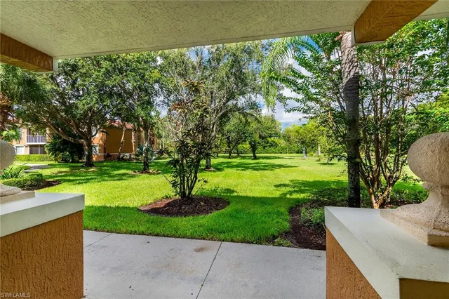 a park view with a outdoor seating space