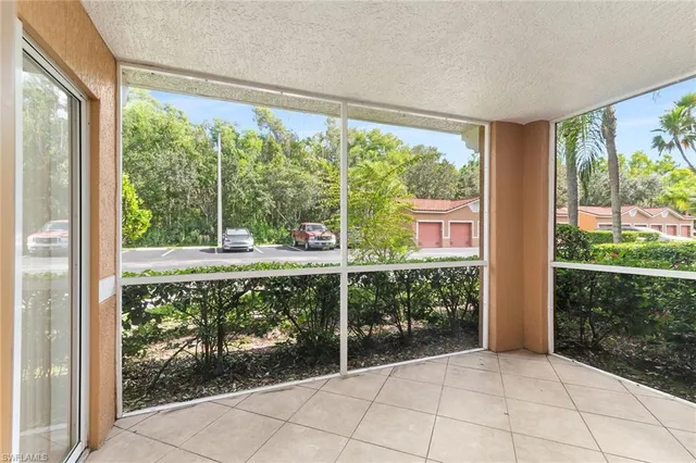 a front view of a house with backyard from balcony