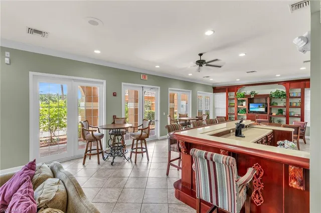 a dining hall with furniture a window and a view