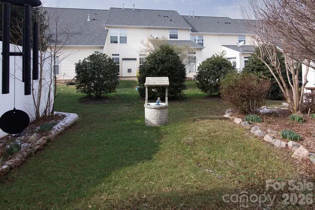 a backyard of a house with seating space