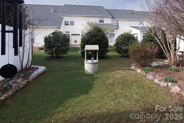 a backyard of a house with seating space